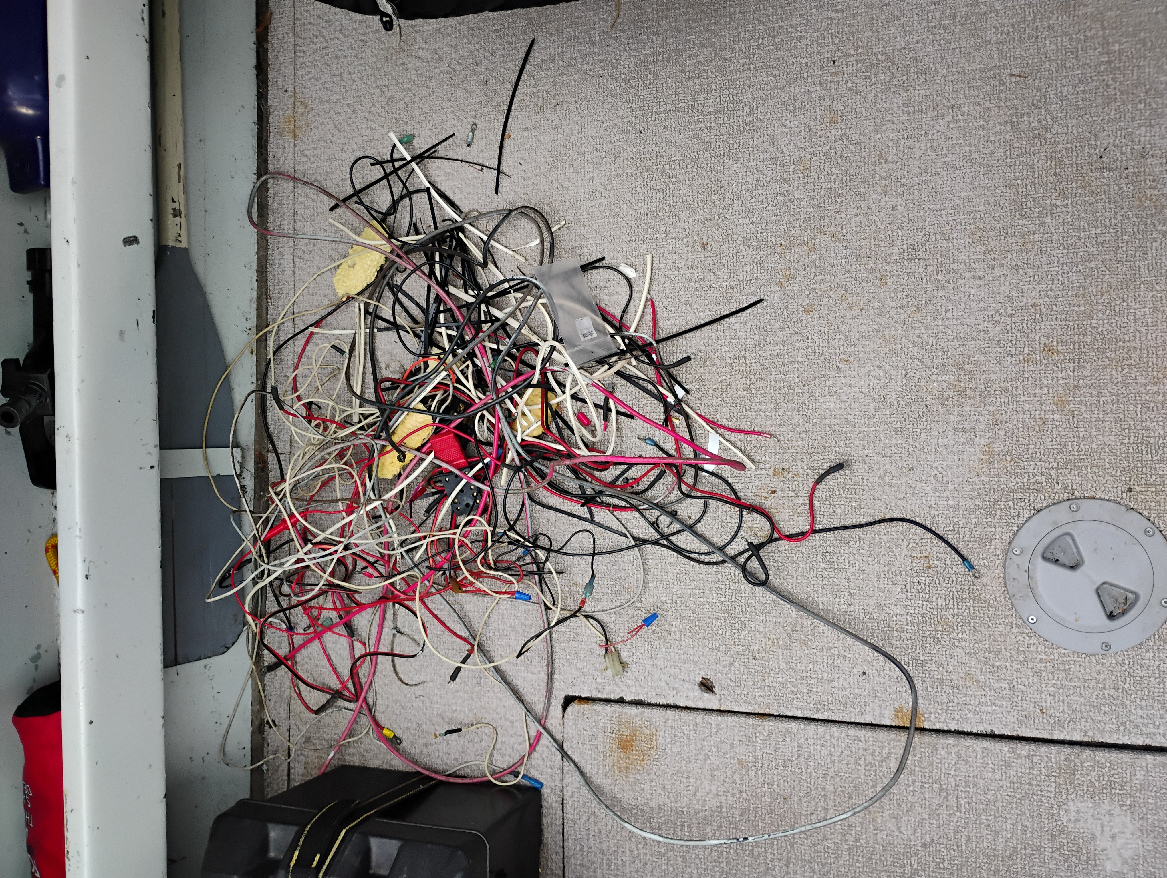 Marine distribution panel with main breakers and fuse block during a vessel inspection