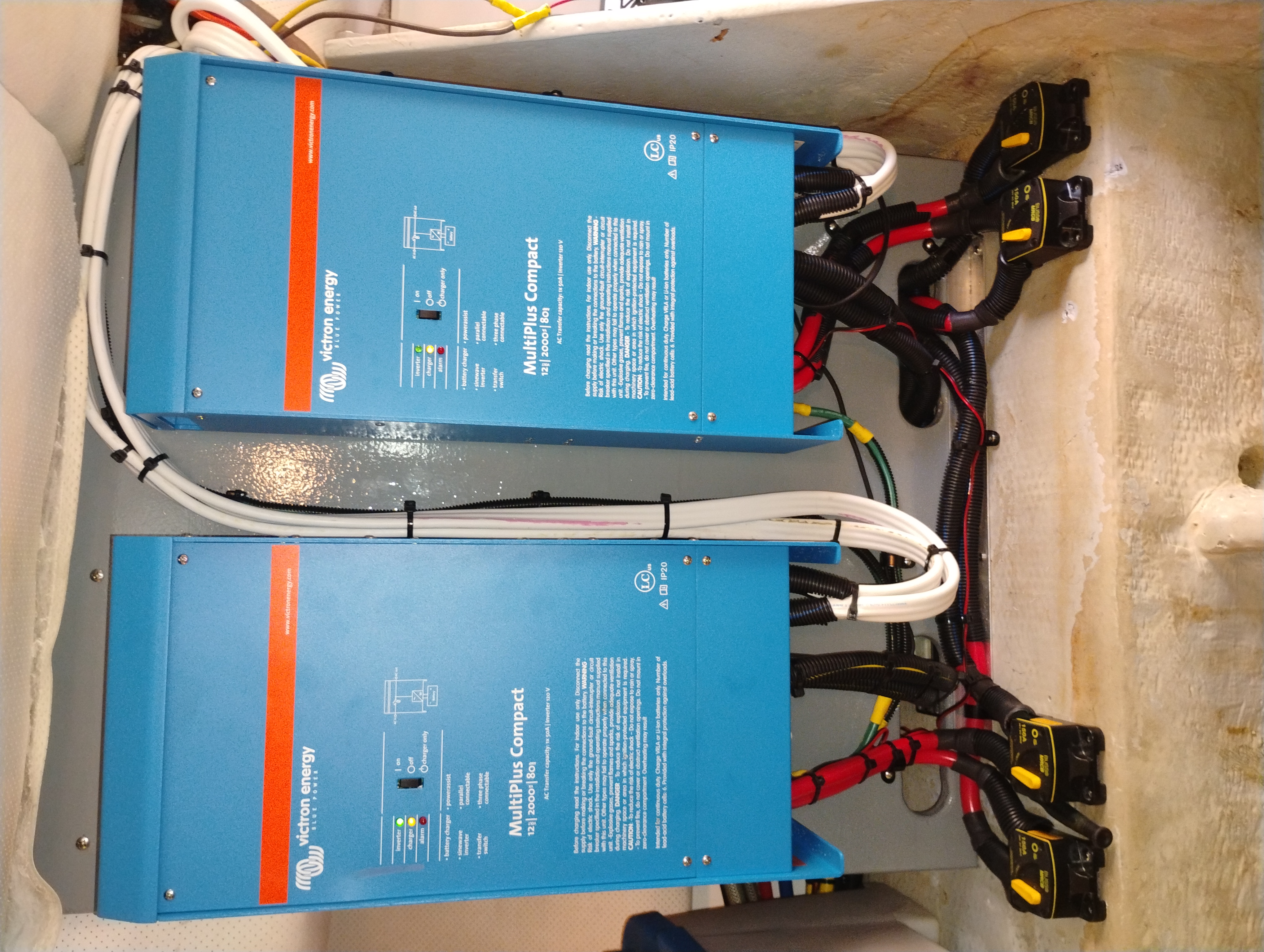 Two Victron MultiPlus Compact inverter/chargers installed in parallel with terminal cables